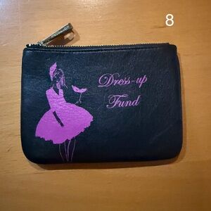 Rebecca Minkoff Black and Pink Coin Purse with "’Dress up Fund’" Written on it.